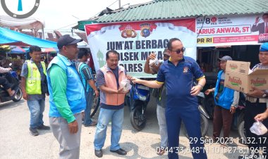Jumat Berbagai, Kapolsek Minas Bagikan Puluhan Nasi Bungkus Kepada Masyarakat di Minas Jaya 