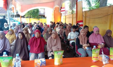 "Sabarudi Menyebarkan Luas Informasi Peraturan Daerah di Jalan Kenanga RT 01 RW 02 Kulim"